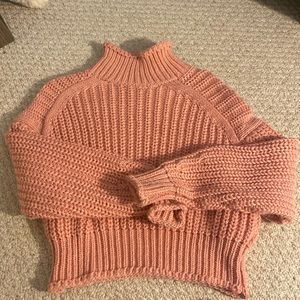 Women’s light pink sweater